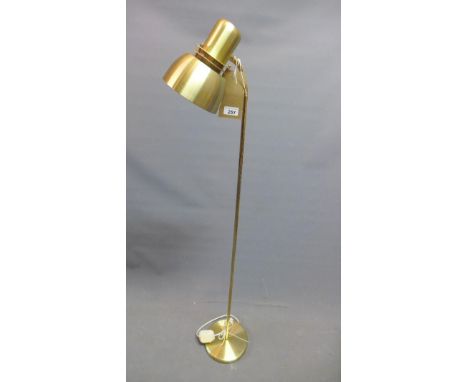 A 1970's brass standard lamp, with shade on adjustable flex and straight column 