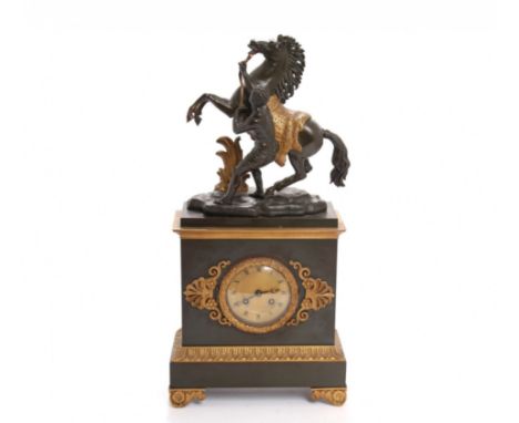 Mantel clock Marley Horses, decorated with bronze and gilded figure of a young man taming horses. The Horse Tamer marble scul