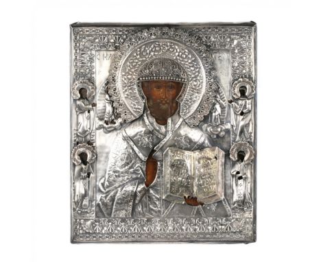An analogion image of St. Nicholas the Wonderworker in a massive silver setting in 1836. The classical iconography of the ble