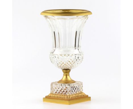 Crystal vase with gilded bronze and diamond rustication at the bases. Classic proportions and design. H-35 cm. Width: 20cm, H