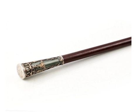 A cane with a thin elegant tip from the times of the second empire, made of silver with a guilloche enamel backing. The handl