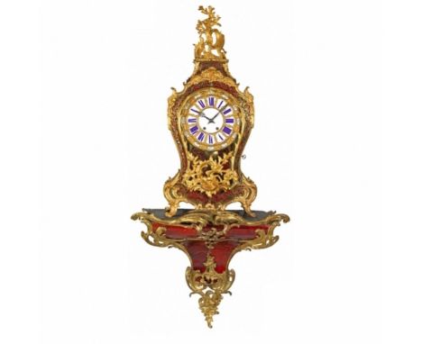 Unique interior clock with a console, made in the Boulle style. The watch is richly decorated with artistic elements of gilde