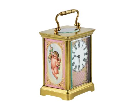 French carriage clock in a brass case, with gilded and painted porcelain panels, in the spirit of the third rococo. On a pink