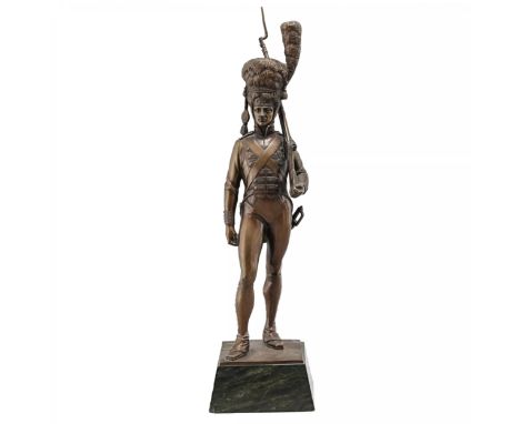 Bronze figure Soldier. It depicts a soldier of the Old Guard on the march. With a rifle on his shoulder, he seems to be posin