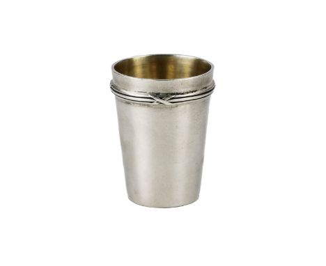 Silver stack. K. Faberge. Laconic object of a truncated cone. Decorated with a weaving of a decorative belt along the body of