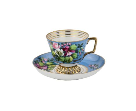 Tea pastoral from a cup and saucer of Kuznetsov`s Dulevo Factory. Blooming gardens framed in gold are depicted on a light, bl