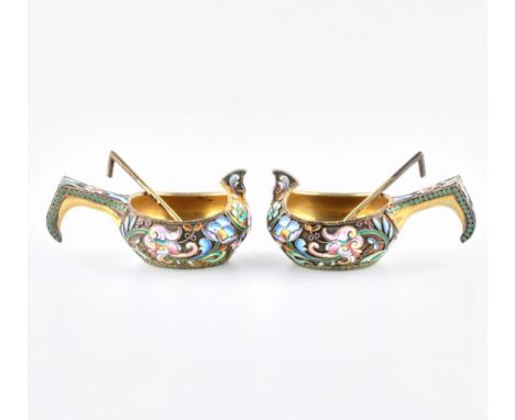 A pair of silver ladles - cloisonne enamel salt cellars with spoons. Identical decorative program of painted enamels, made on