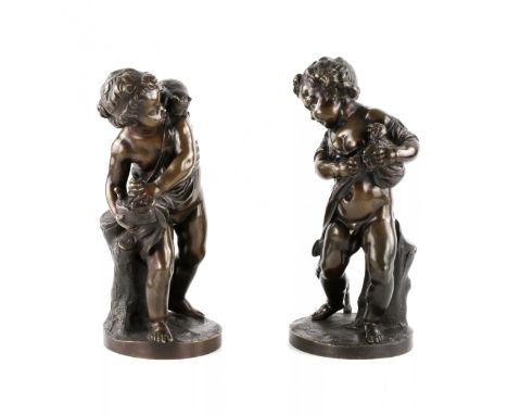 A pair of ironic bronze figures. Depicting Putti in a difficult relationship with a cat and a dog. H-28 cm. Width: 26cm, Heig