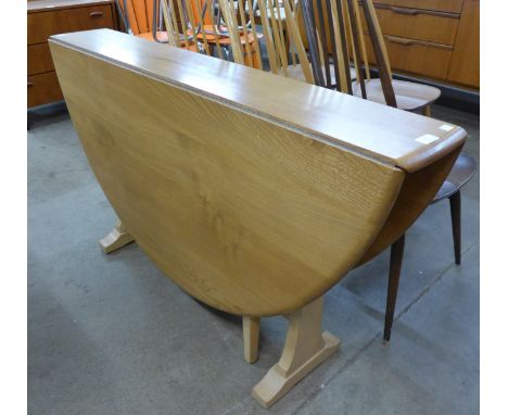 An Ercol Blonde ash drop-leaf table 