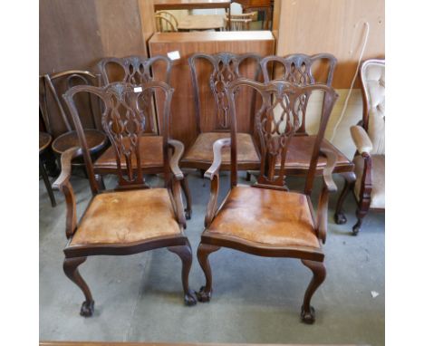 A set of five Chippendale Revival mahogany dining chairs 