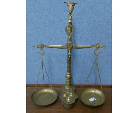 A set of brass bankers scales, with weights 