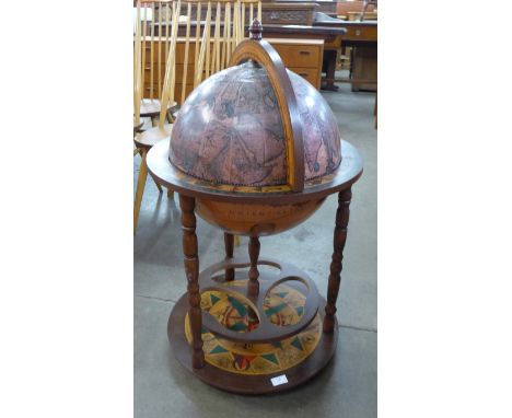 An Italian terrestrial globe cocktail cabinet/trolley 