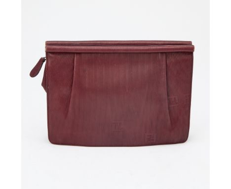 Zip top clutch with embossed 'FF' logo throughout, interior lined with logo fabric and one side zippered pocket, signed Fendi