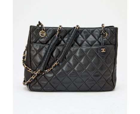 Tote bag with gold-tone hardware and dual woven through leather chain straps, double 'CC' charm, two outside large slip pocke
