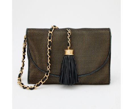 Shoulder bag with black and gold thread, black leather trim, gold-tone hardware, woven through leather strap and tassel with 