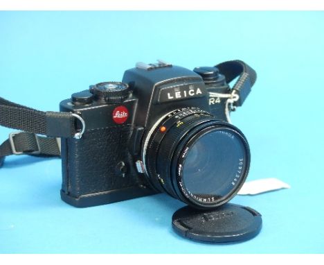 A Leica R4 SLR Camera, black, No.1560708, with Summicron-R 50mm f2 lens, and two other Leitz lenses: Elmarit-R 35mm f2.8 wide