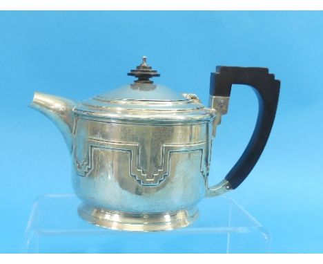 A George V silver Teapot, by Walker &amp; Hall, hallmarked Sheffield, 1934, of circular form, decorated in the Art Deco style