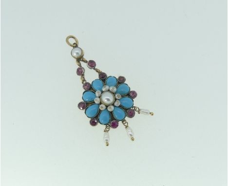 An attractive Pendant, in the form of a flower head, set with seed pearls, turquoise and pale rubies, with three drop seed pe