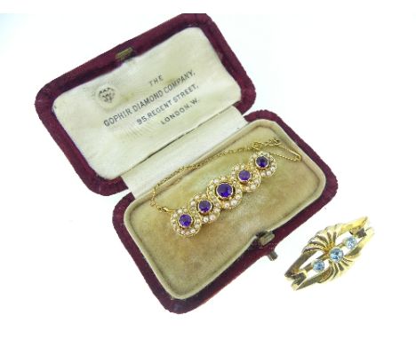 A 9ct yellow gold Brooch, the centre set with three pale blue stones, in fitted case, together with an amethyst and seed pear