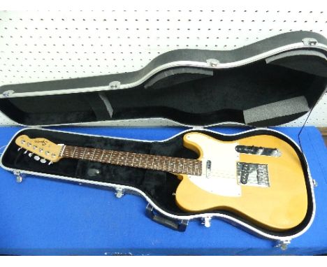A Squier Tele Affinity Series electric guitar, butterscotch blond, and a Squier guitar case, together with a Stagg hard guita