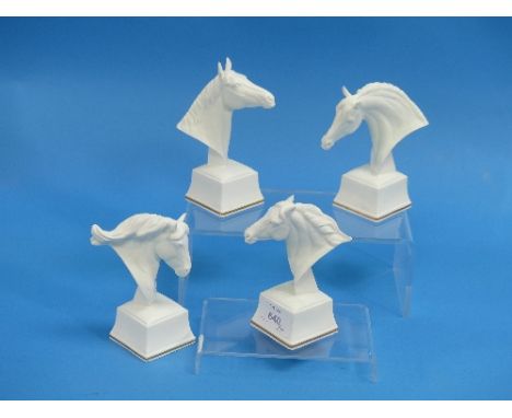 A set of four Royal Worcester porcelain horse's heads, white with gilt-line decoration, titled Bronte, Chronos, Eous and Lamp