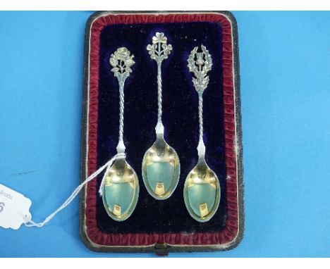 A cased set of three silver Spoons, by Charles Boyton, hallmarked London 1892, each finial cast as a 'national symbol' - Rose