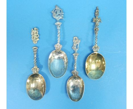 An early 19thC Dutch silver Birth Spoon, of traditional form with the finial moulded as a pair of lovers, the reverse of the 