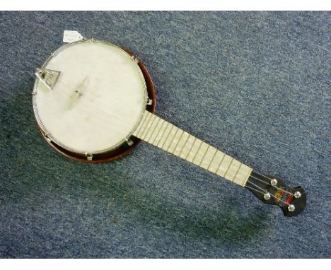 The Broadcaster; a 1930's ukulele-banjo / banjolele, four string, 21¾in (55.25cm) long, together with a vintage carry case.