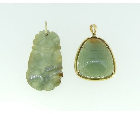A gold mounted triangular shape carved jade Buddha, marked in suspension loop 585, together with another carved jade pendant 