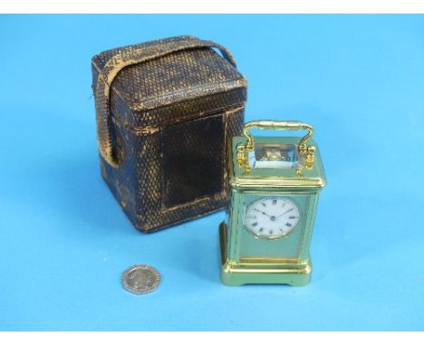 A late 19th century French gilt brass miniature Carriage Clock, by Henri Jacot, of five-glass form with enamel dial, signed o