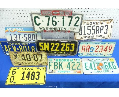 Automobilia; A collection of eight vintage American Licence Plates, including Iowa '59, Colorado, '75, Washington, '51, etc.,