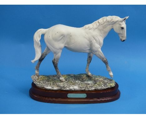 A Royal Doulton model of 'Desert Orchid', DA134, designed by Graham Tongue, limited edition No. 62 of 7500, with wood stand, 