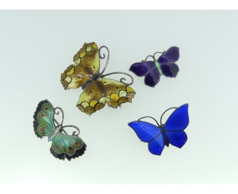 A collection of four silver and enamel Butterfly Brooches, two marked TLM sterling, one marked sterling silver, the other mar