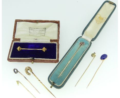 A collection of Stickpins, including one with  rose diamonds and three diamond shaped rubies across the centre in a 'Goldsmit