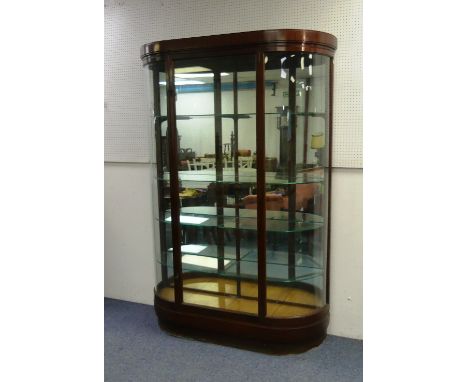 An Early 20thC Pollard mahogany Bow Front Mirror Backed Milliner's Display Cabinet, with flat fronted cornice single central 