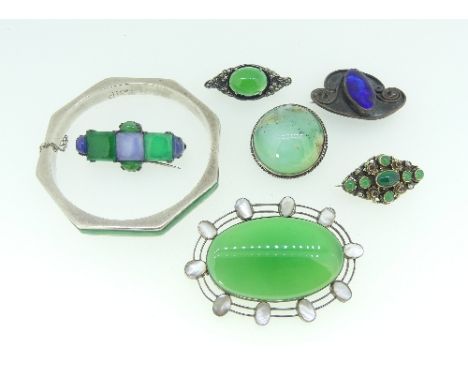 A small collection of Jewellery, including an Austro-Hungarian brooch with green and amethyst paste stones, another similar s