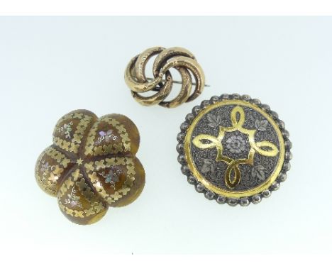 A Brooch, in blond tortoiseshell, formed of five lobed sections, picque set, with white and yellow metal and mother of pearl,