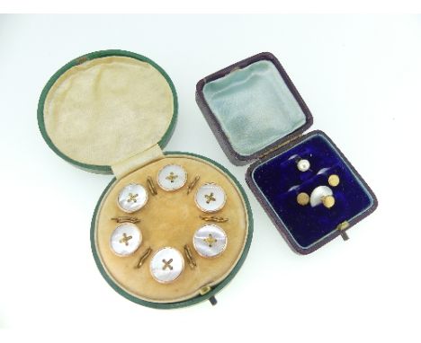 A cased set of six mother of pearl Buttons, within an unmarked rose colour metal surround, in velvet lined fitted case, toget
