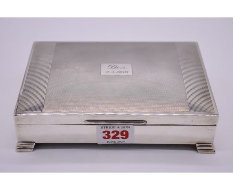 A silver cigarette box,&nbsp;by&nbsp;Viners,&nbsp;Sheffield 1958,&nbsp;having engine turned decoration,&nbsp;17cm. 