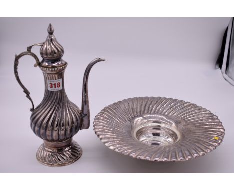 A Turkish metal ewer and basin, stamped 900, maker A L., 32cm high. 