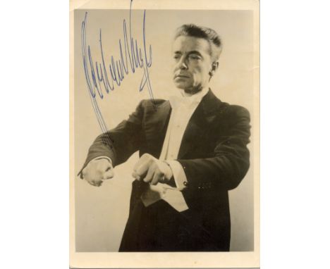 KARAJAN HERBERT VON: (1908-1989) Austrian Conductor. Vintage signed 4 x 6 postcard photograph, the dramatic image depicting K