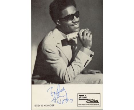 WONDER STEVIE: (1950-  ) American Singer and Musician. Rare signed and inscribed postcard photograph, the Tamla Motown promot