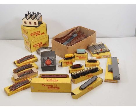 A tray of TRIANG TT scale model railway items comprising wagons, buildings, accessories and track - generally G in F/G boxes 