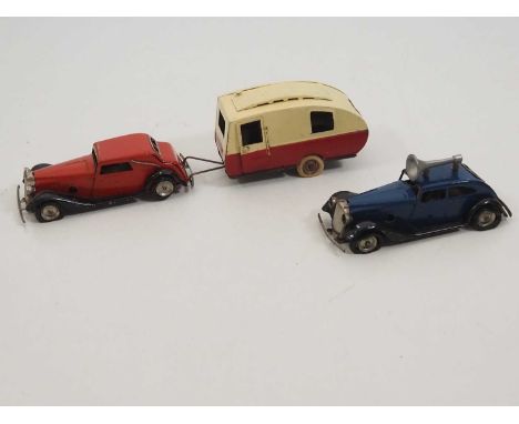 A group of vintage TRIANG MINIC clockwork cars and caravan as lotted - F/G (unboxed) (3)