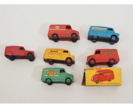 A group of DINKY diecast vans to include Trojan and Bedford examples, Dunlop example is boxed (one flap detached but present)