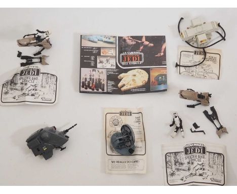 A group of vintage Star Wars small vehicles all unboxed, mostly with instructions, together with a Star Wars toy range poster