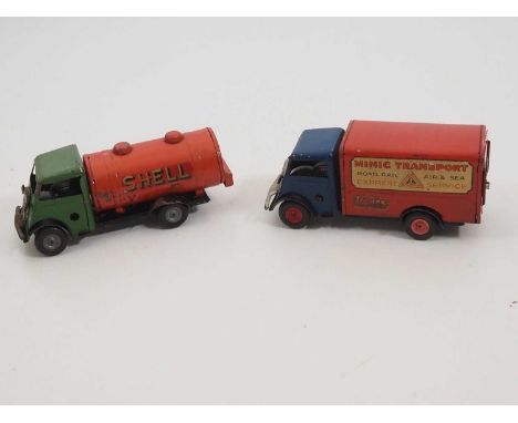 A pair of vintage TRIANG MINIC clockwork lorries comprising a fuel tanker and a delivery lorry - F/G (unboxed) (2)