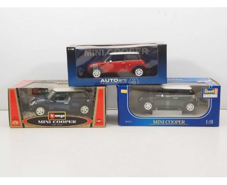 A group of diecast 1:18 scale Mini Cooper cars by BBURAGO, REVELL and AUTOART - VG/E in VG boxes (3)