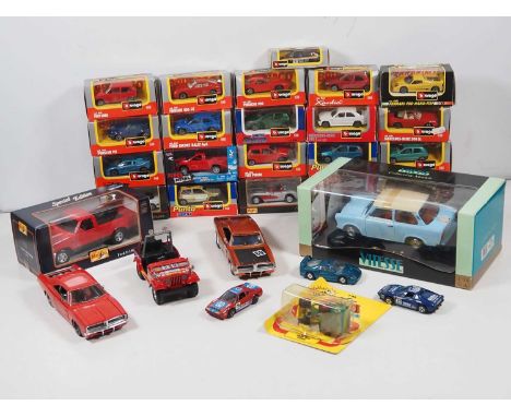 A quantity of larger scale boxed and unboxed diecast vehicles by MAISTO, BBURAGO and VITESSE - G/VG in G/VG boxes (where boxe