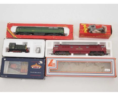 A group of OO gauge diesel locomotives by HORNBY, LIMA and BACHMANN together with a TRIANG Battle Space Turbo Car chassis onl